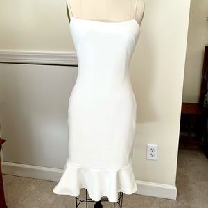 Sleeveless White Dress w/ Ruffled Hem